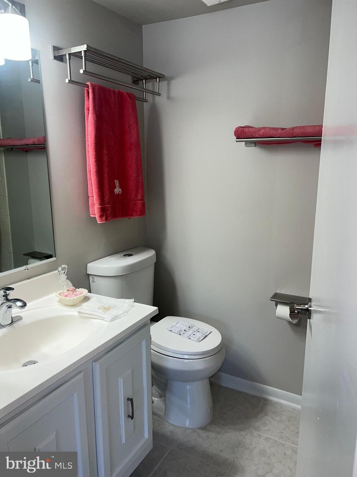 15300 Beaverbrook Court, Unit 882B Silver Spring, MD 20906 - Photo 20 of 44 a bathroom with a sink toilet and shower