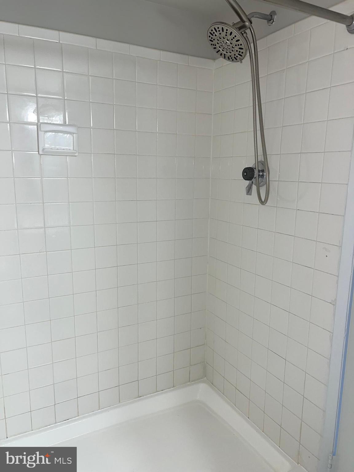 15300 Beaverbrook Court, Unit 882B Silver Spring, MD 20906 - Photo 22 of 44 a bathroom with a shower