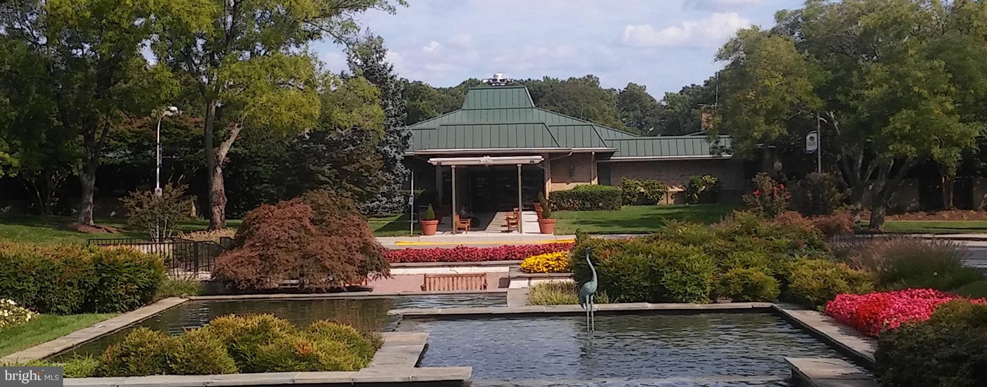 15300 Beaverbrook Court, Unit 882B Silver Spring, MD 20906 - Photo 38 of 44 a front view of a house with garden