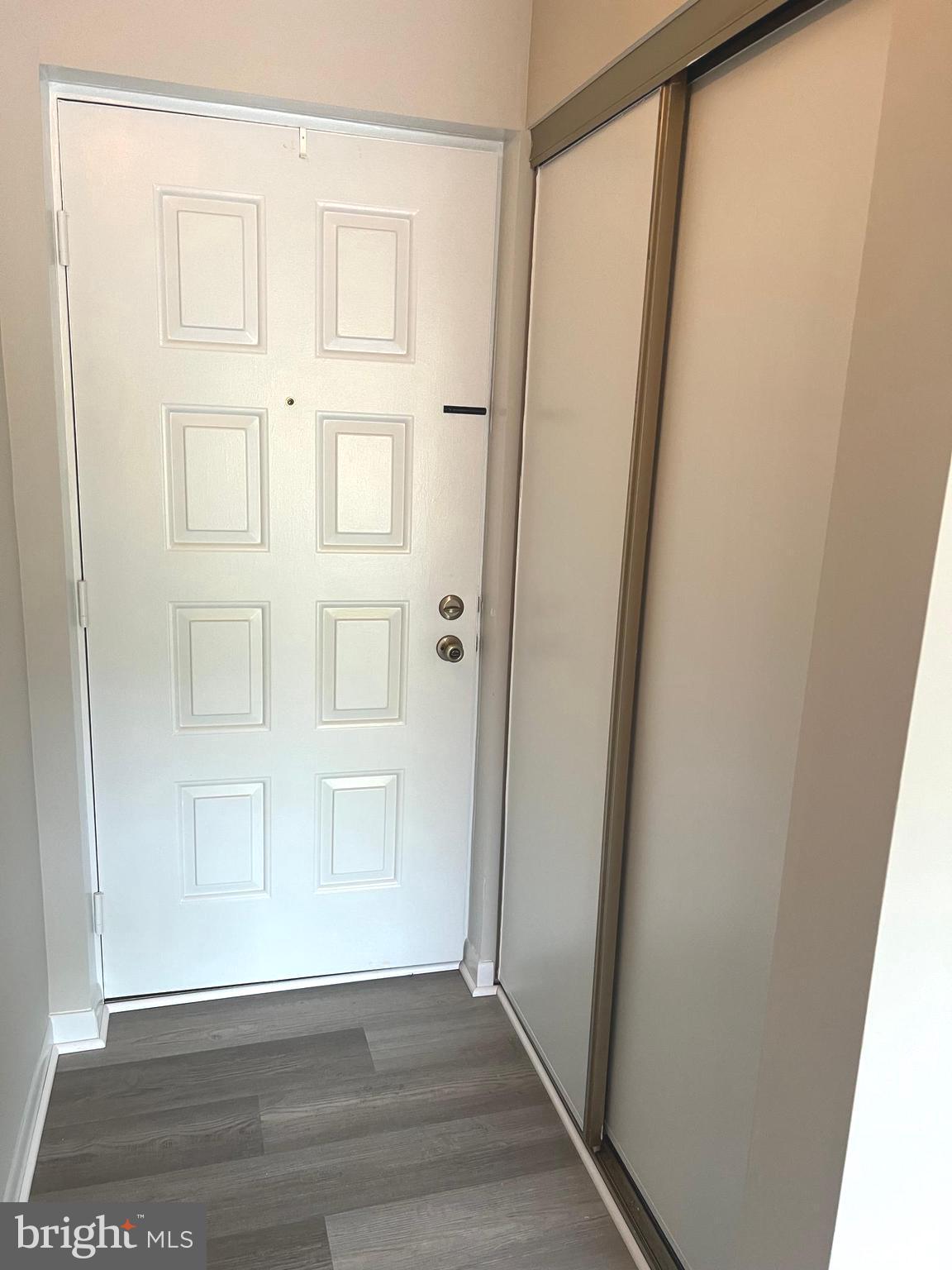 15300 Beaverbrook Court, Unit 882B Silver Spring, MD 20906 - Photo 5 of 44 a view of an entryway with wooden floor