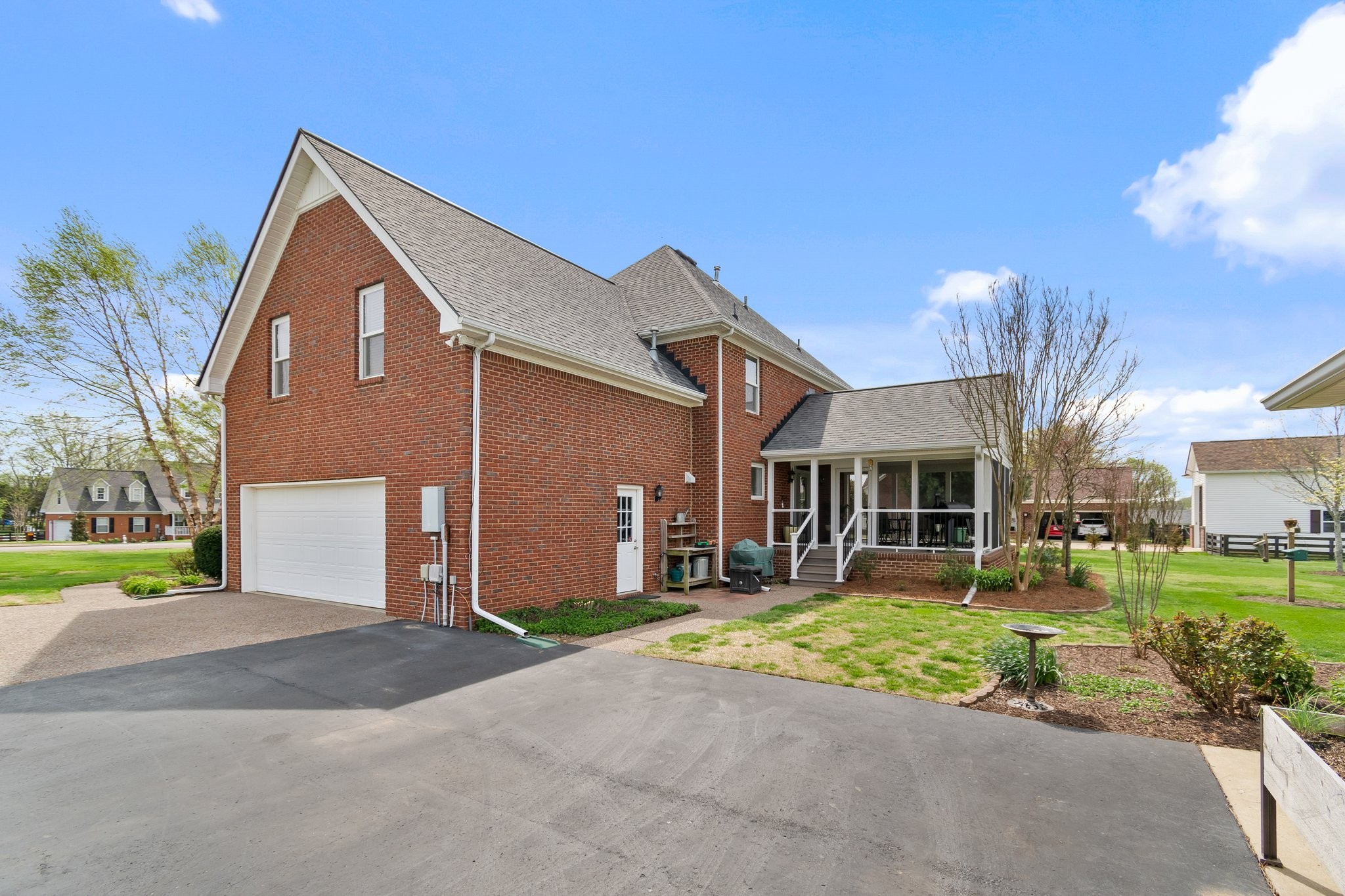 1922 Victorian Road Columbia, TN 38401 - Photo 23 of 25 a front view of a house with a yard and garage