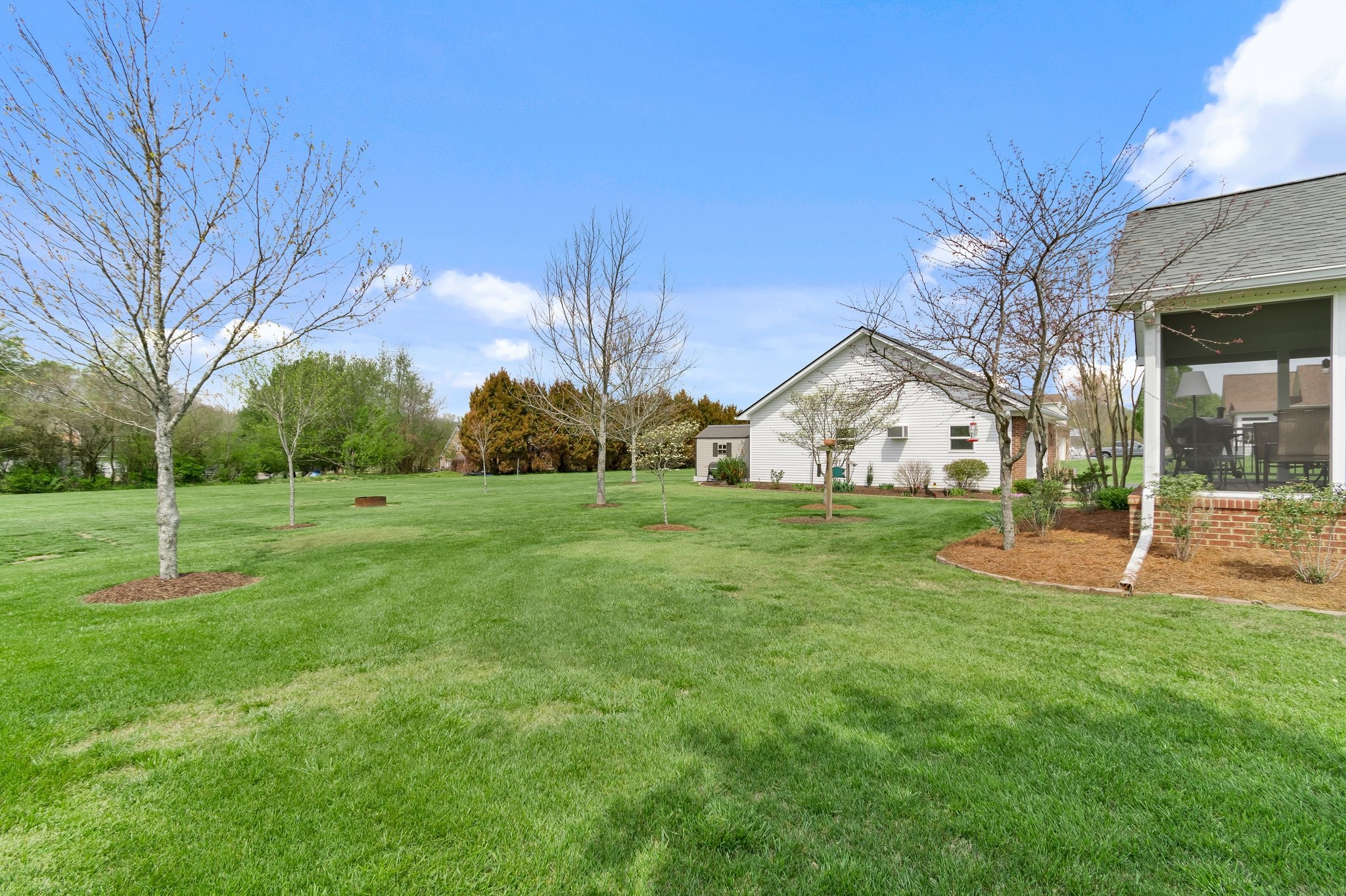 1922 Victorian Road Columbia, TN 38401 - Photo 24 of 25 a view of a white house with a big yard and large trees
