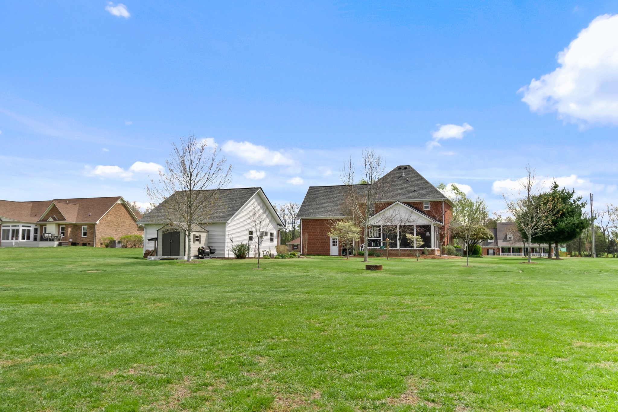 1922 Victorian Road Columbia, TN 38401 - Photo 25 of 25 a view of a big house with a big yard and large trees