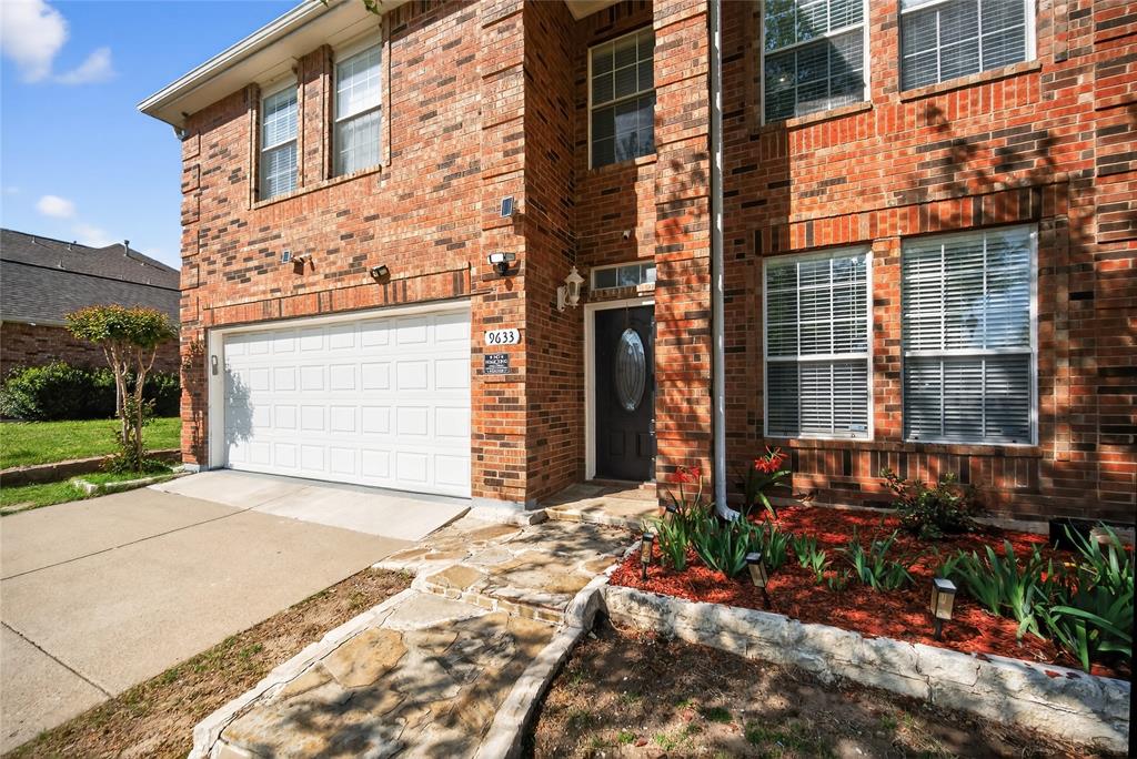 9633 Anns Way Plano, TX 75025 - Photo 4 of 37 a front view of a building with a yard