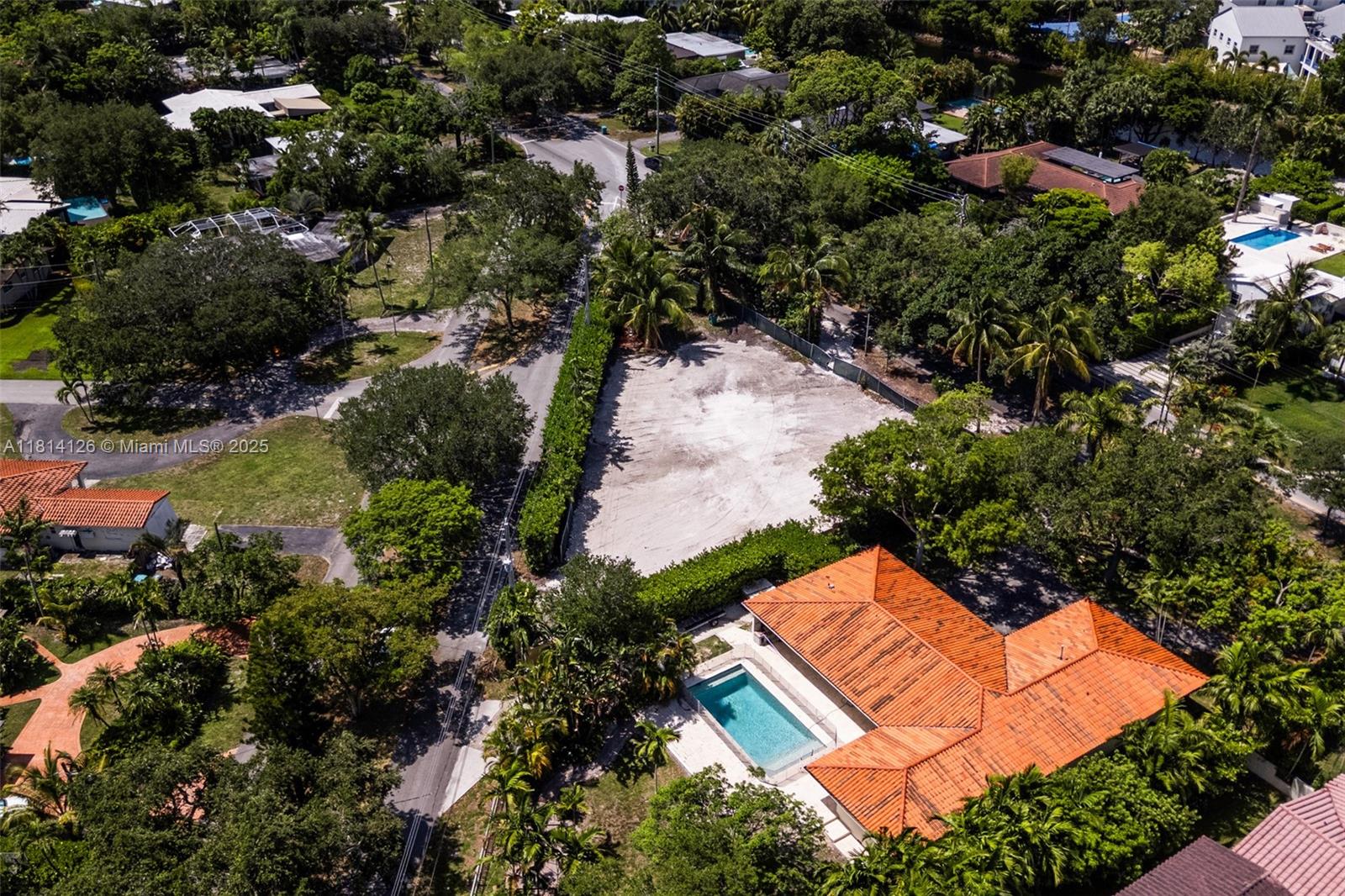 10801 Griffing Boulevard Biscayne Park, FL 33161 - Photo 2 of 13 an aerial view of residential house with outdoor space and swimming pool