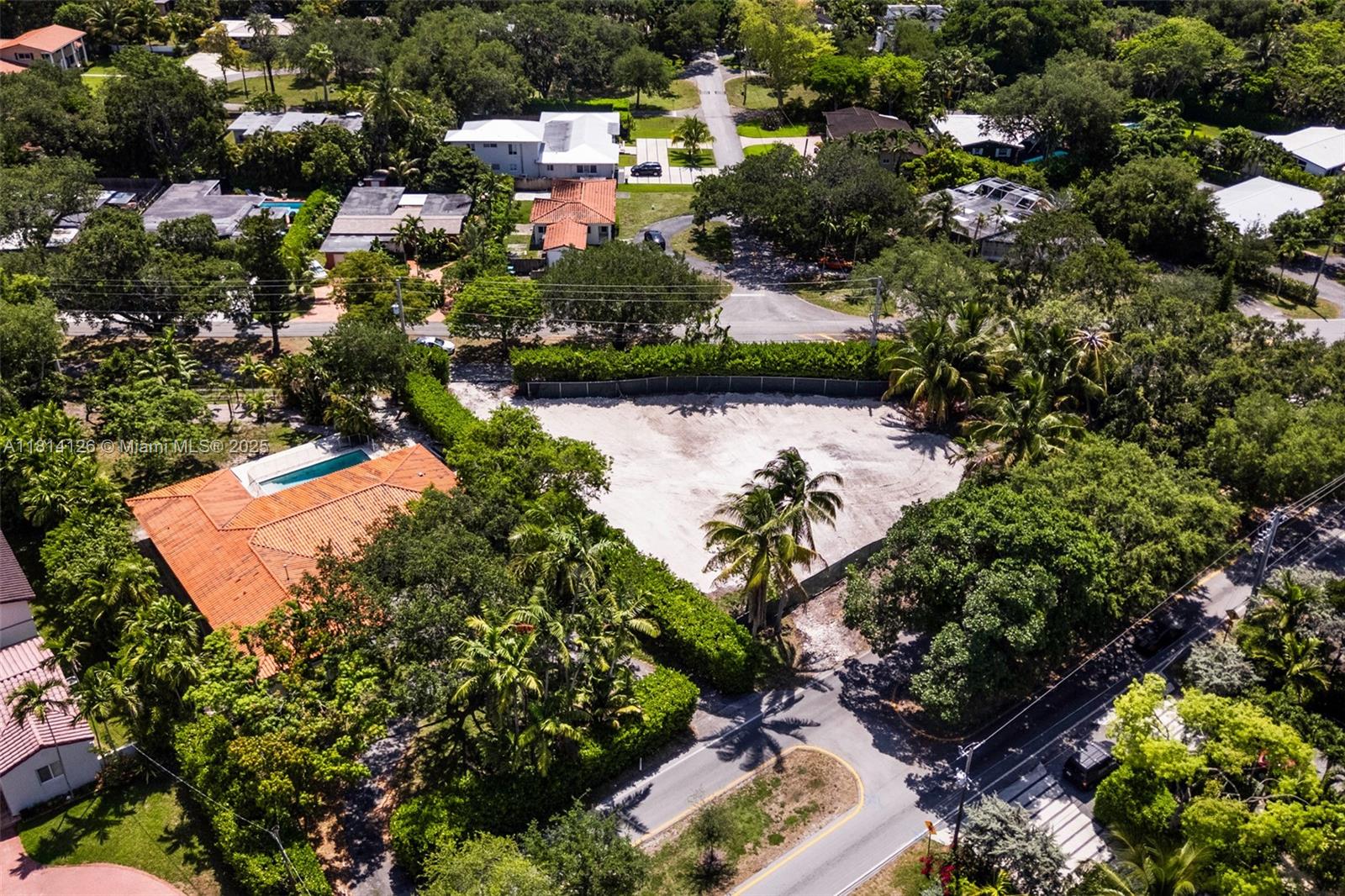 10801 Griffing Boulevard Biscayne Park, FL 33161 - Photo 3 of 13 an aerial view of residential house with outdoor space and swimming pool