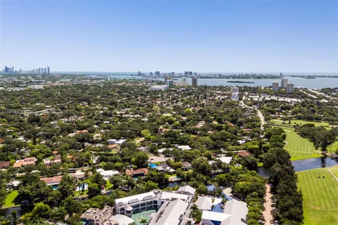 an aerial view of a city with lots of residential buildings