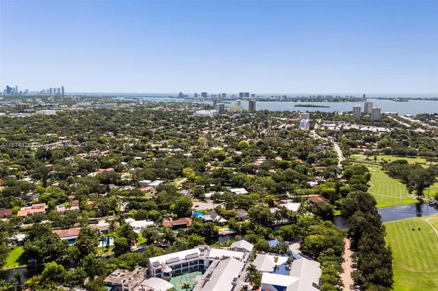 an aerial view of a city with lots of residential buildings