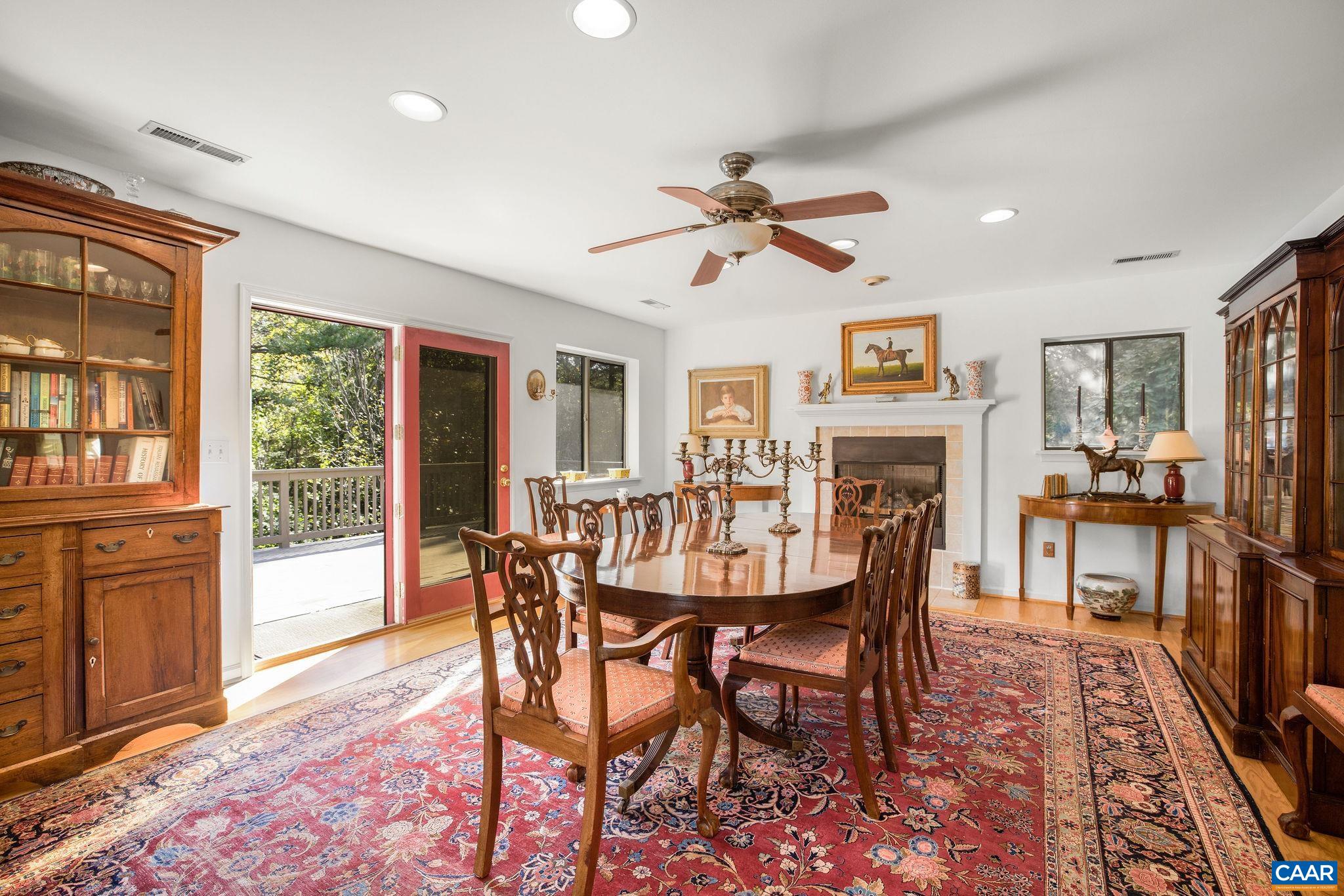 1249 Timberbranch Court Charlottesville, VA 22902 - Photo 11 of 34 a view of a dining room with furniture window and wooden floor