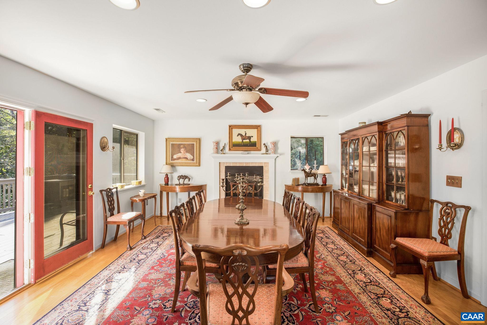1249 Timberbranch Court Charlottesville, VA 22902 - Photo 12 of 34 a view of a dining room with furniture window and wooden floor