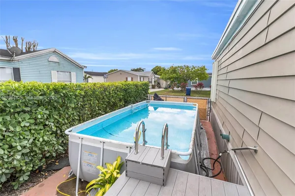 a view of balcony with furniture