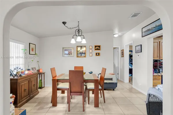 a view of a dining room with furniture