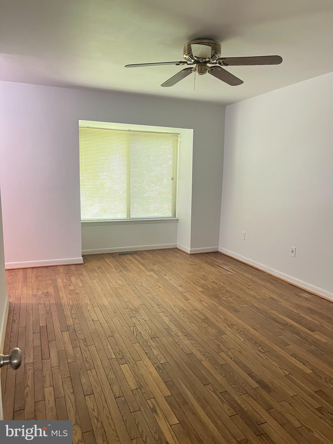 2040 Golf Course Drive Reston, VA 20191 - Photo 19 of 34 wooden floor in an empty room