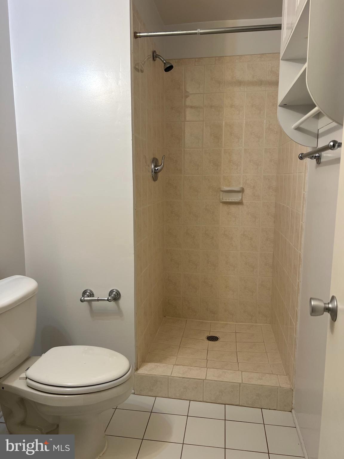 2040 Golf Course Drive Reston, VA 20191 - Photo 30 of 34 a white toilet sitting next to a bath tub