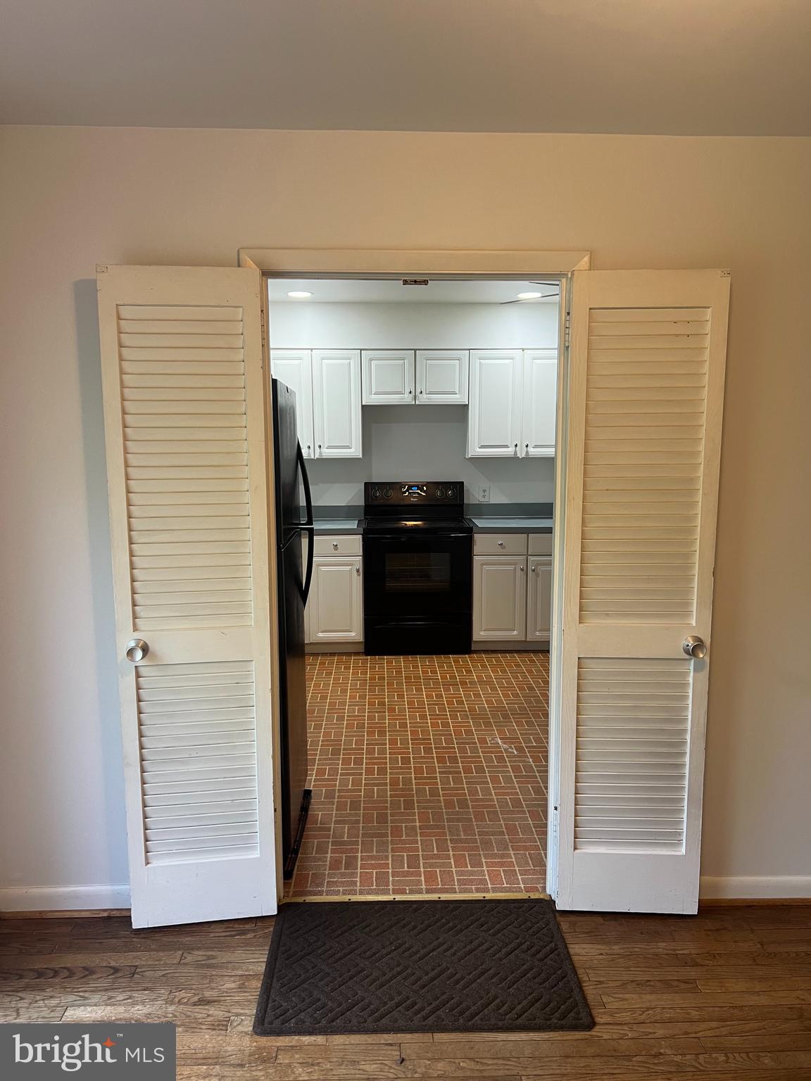 2040 Golf Course Drive Reston, VA 20191 - Photo 7 of 34 a view of a closet area with living room