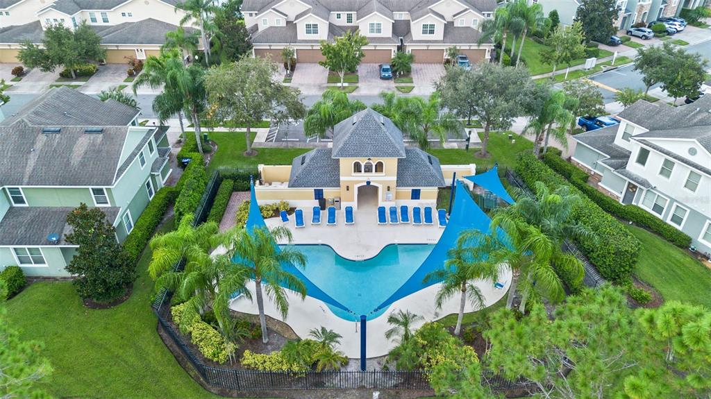 551 Terrace Spring Drive Orlando, FL 32828 - Photo 35 of 41 a aerial view of a house with swimming pool and a yard