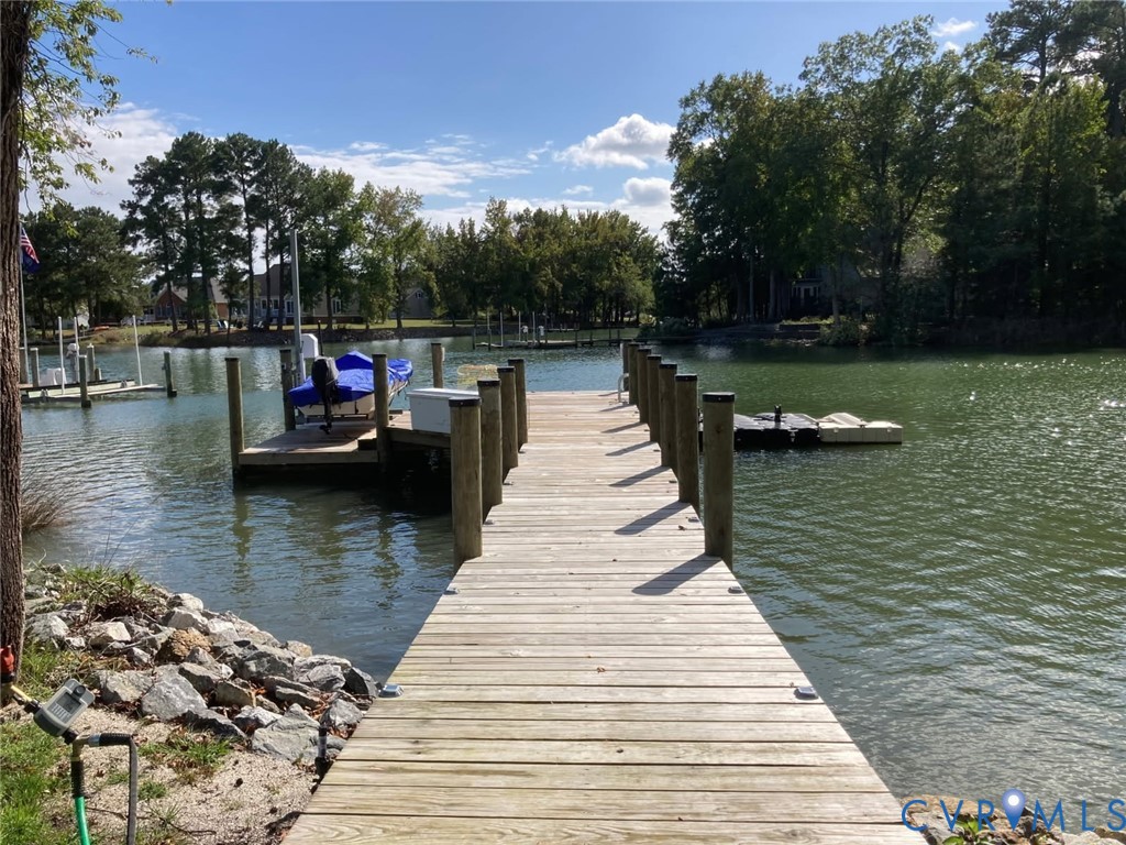 36 Rudder Place Heathsville, VA 22473 - Photo 1 of 9 Waterfront property featuring a wood dock, boat li