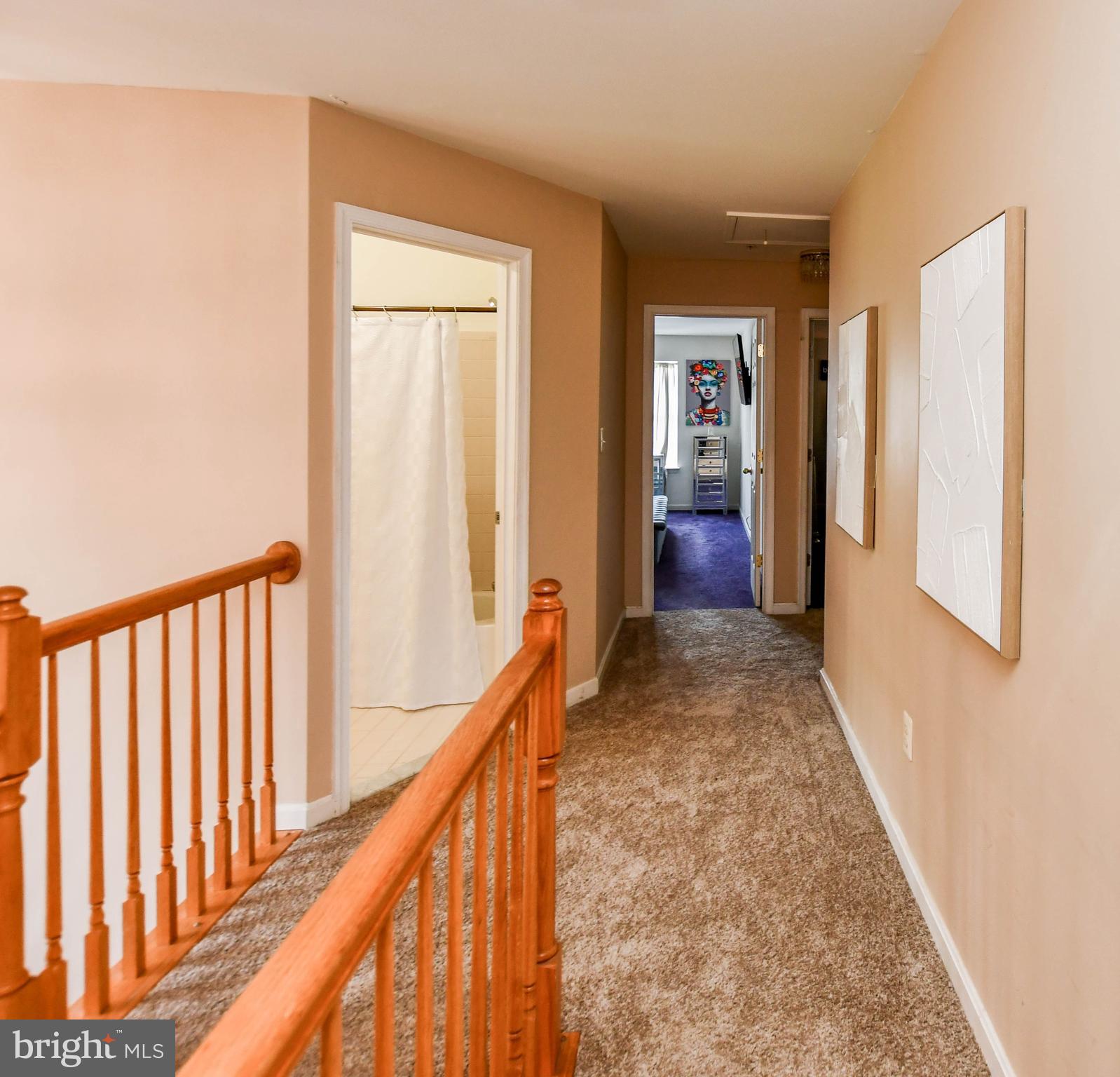 1112 Ryon Way District Heights, MD 20747 - Photo 22 of 63 a view of hallway with wooden floor and stairs
