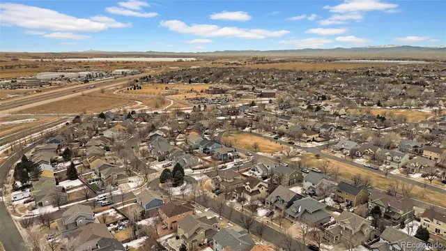 an aerial view of beach and city