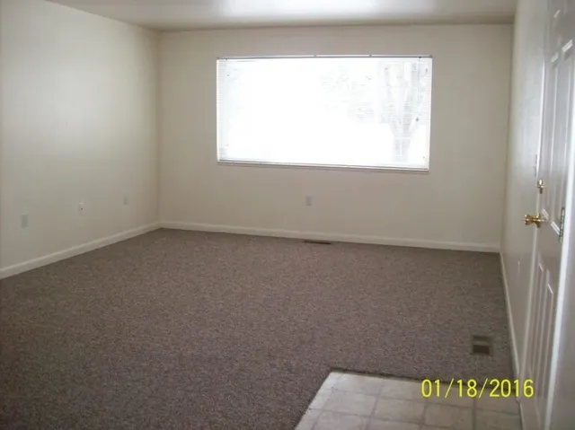 an empty room with a window