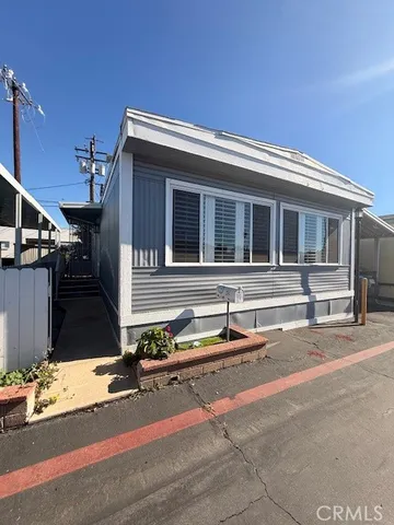 a house view with a outdoor space