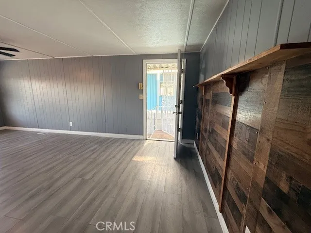 a view of entryway with wooden floor