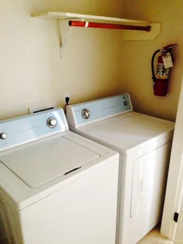 a view of a backyard with lake view