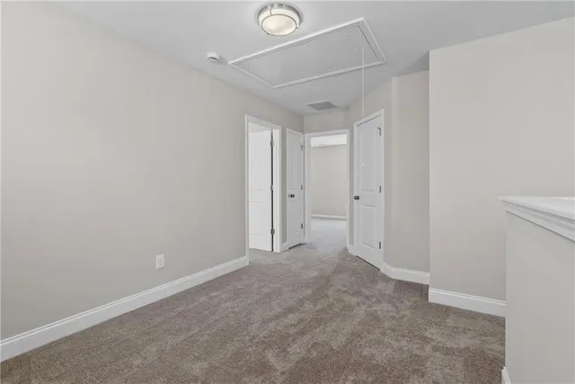 a view of an empty room with a balcony