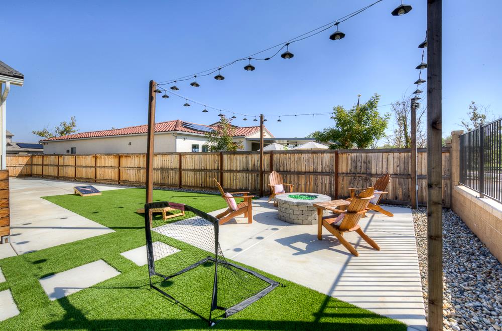 1048 Beaver Pond Loop Madera, CA 93636 - Photo 25 of 27 a view of a terrace with couches
