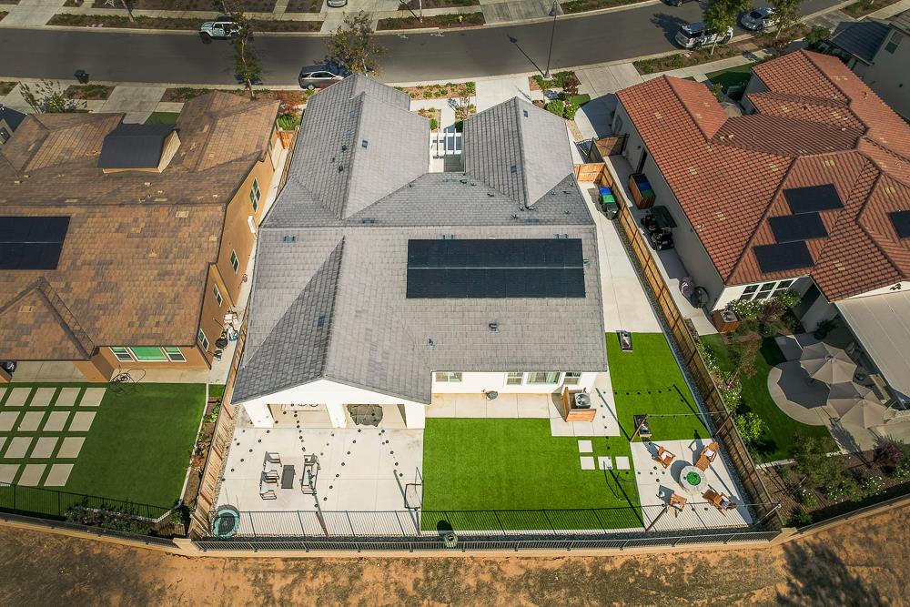 1048 Beaver Pond Loop Madera, CA 93636 - Photo 27 of 27 an aerial view of a residential houses with outdoor space
