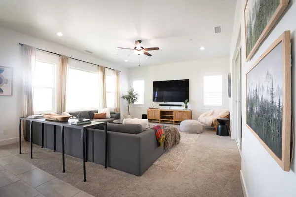 a dining room with furniture and window