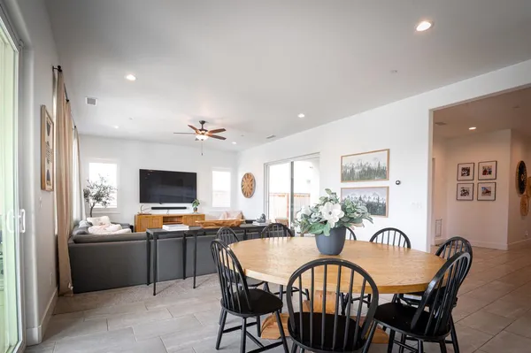 a kitchen with stainless steel appliances granite countertop a stove a microwave and refrigerator