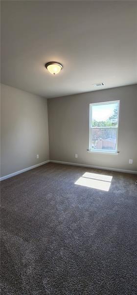 1476 Fern Ridge Lane Norcross, GA 30093 - Photo 7 of 19 an empty room with a window