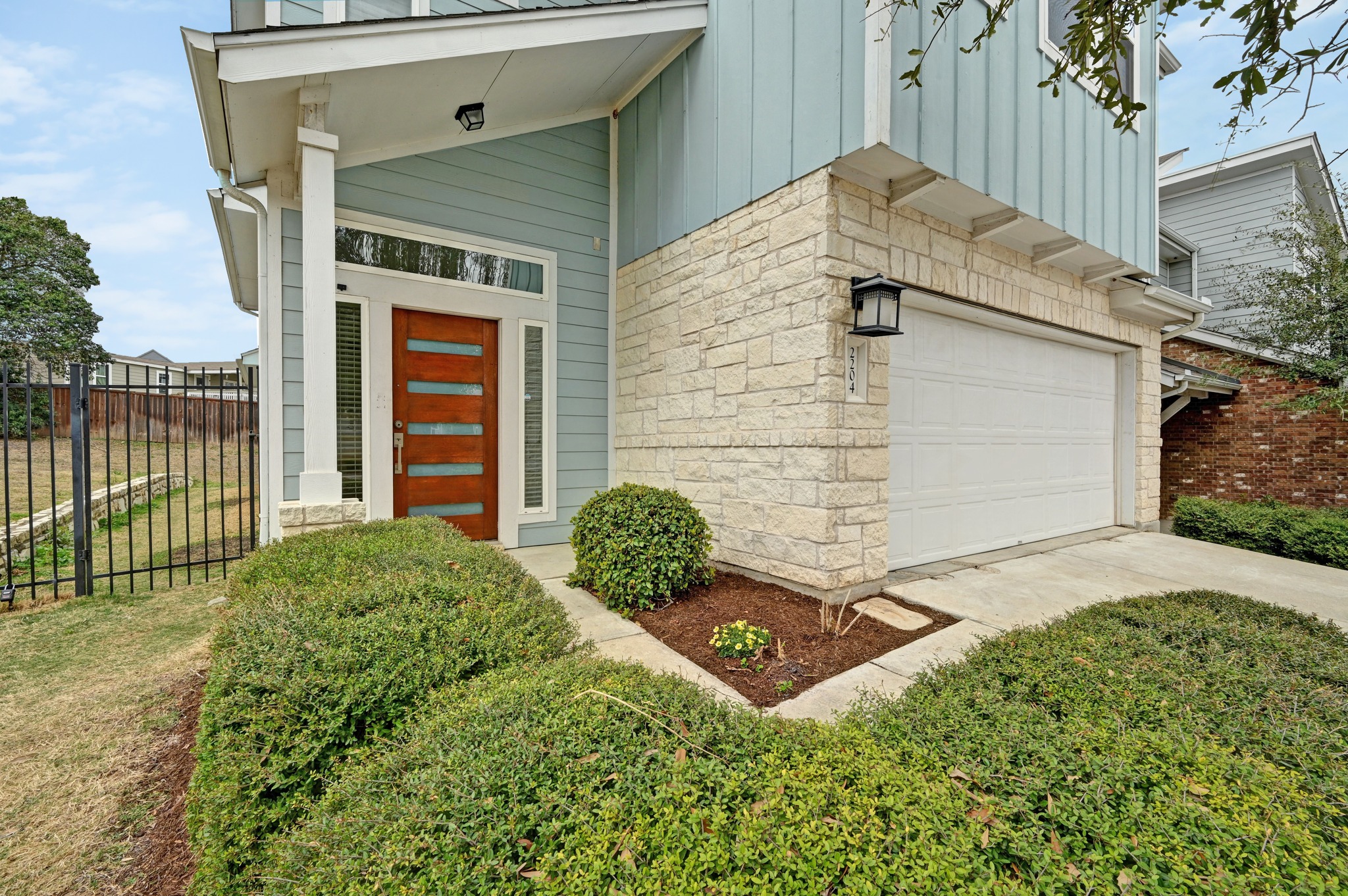 2204 Theseus Pass Austin, TX 78741 - Photo 2 of 31 a backyard of a house
