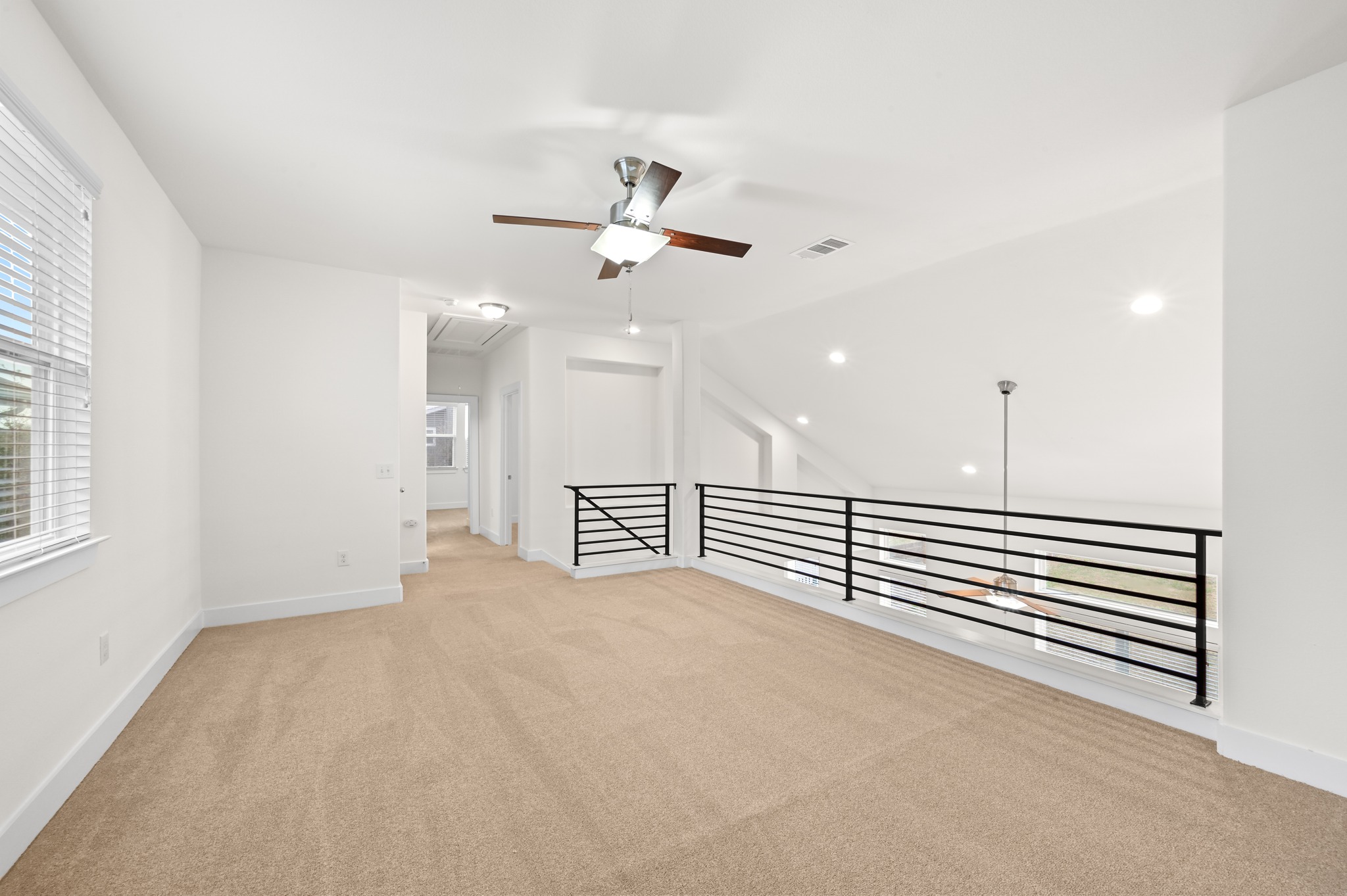 2204 Theseus Pass Austin, TX 78741 - Photo 22 of 31 a view of a livingroom with a ceiling fan and window