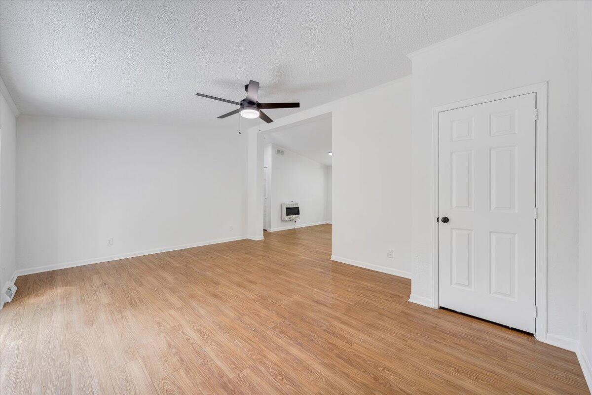 822 Buck Run Drive Critz, VA 24082 - Photo 2 of 55 a view of an empty room with wooden floor