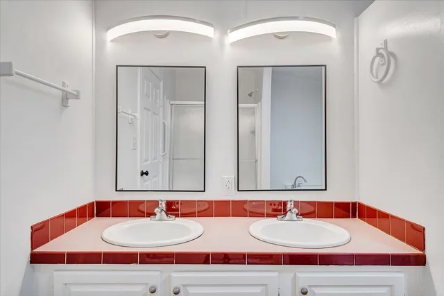 a white bath tub sitting in a bathroom