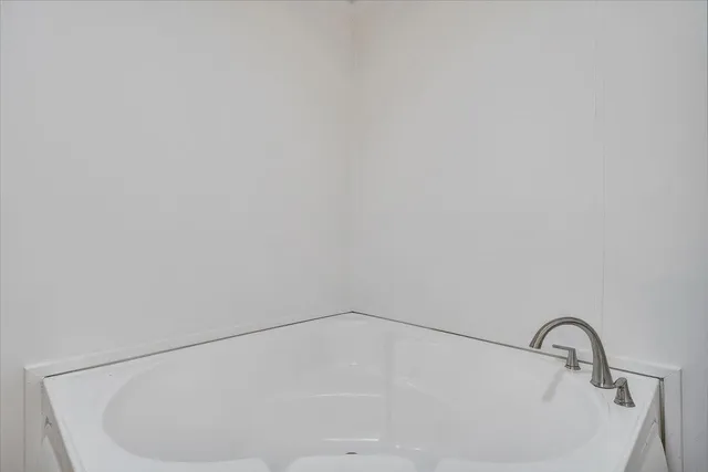 a view of balcony with wooden floor