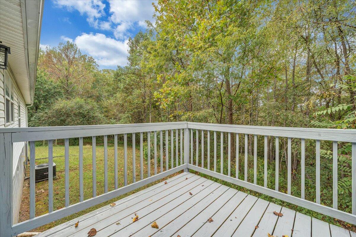 822 Buck Run Drive Critz, VA 24082 - Photo 44 of 55 a view of balcony with wooden floor