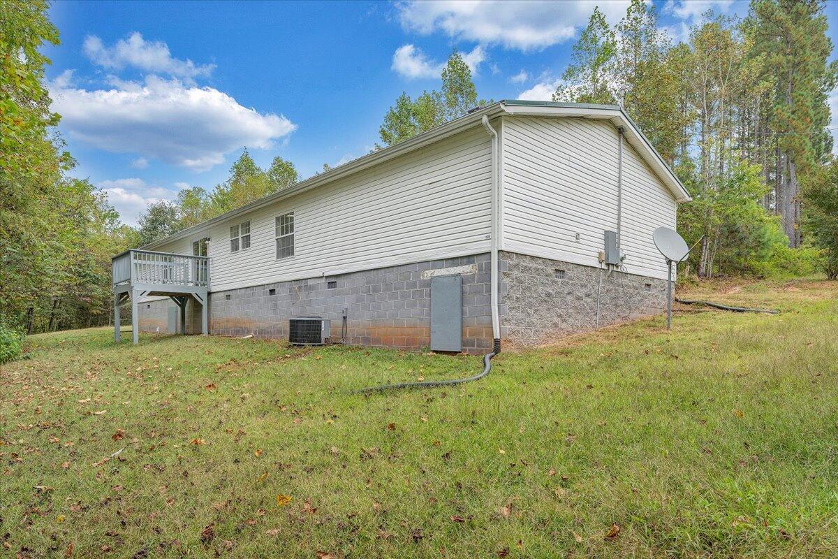 822 Buck Run Drive Critz, VA 24082 - Photo 51 of 55 a view of a house with a yard
