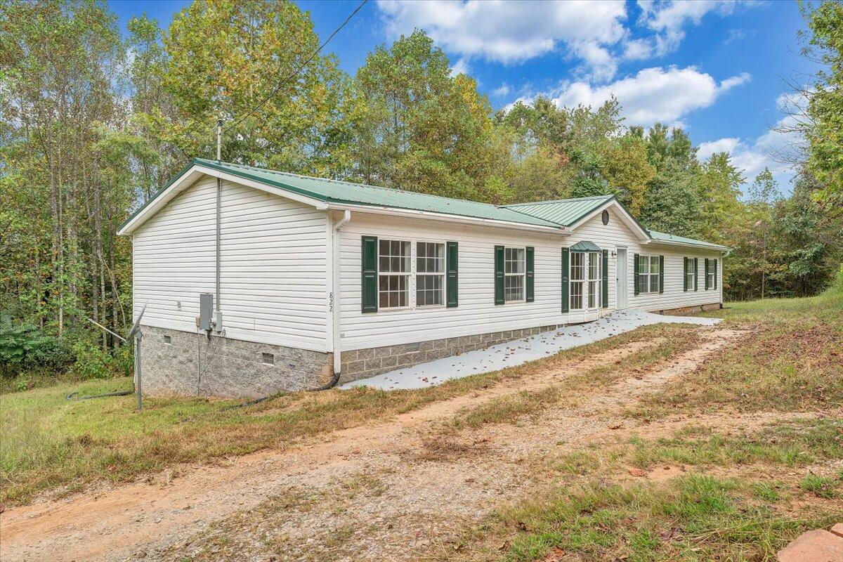 822 Buck Run Drive Critz, VA 24082 - Photo 55 of 55 a view of a house with a backyard