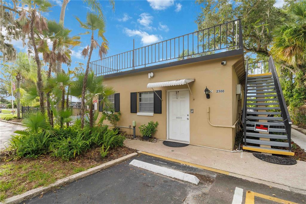 2500 Lee Road, Unit 244 Winter Park, FL 32789 - Photo 21 of 26 front view of a house with a street