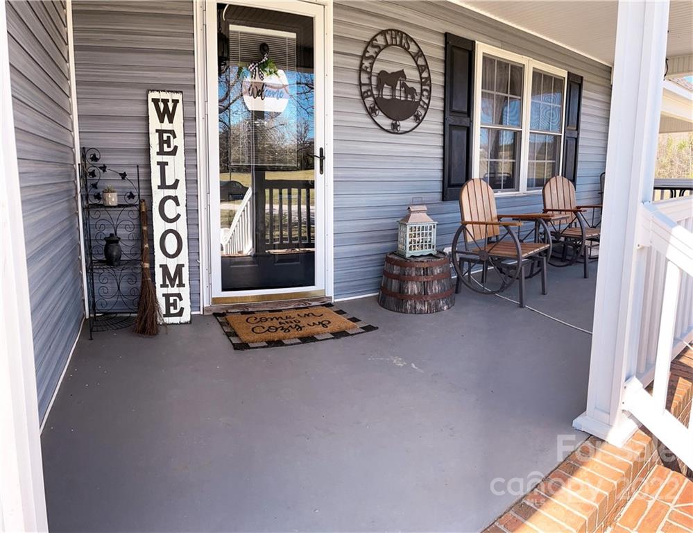 270 Tom Laney Road Lancaster, SC 29720 - Photo 6 of 28 a living room with furniture and large window