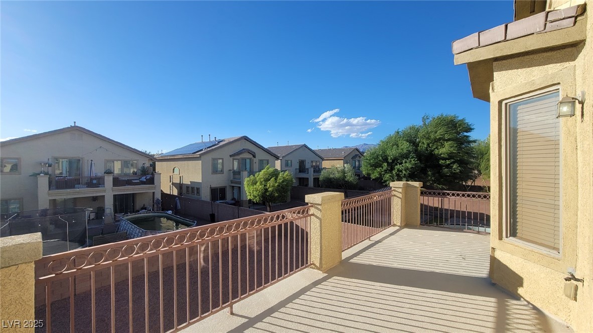 5913 Altissimo Street North Las Vegas, NV 89081 - Photo 16 of 37 Balcony with a residential view