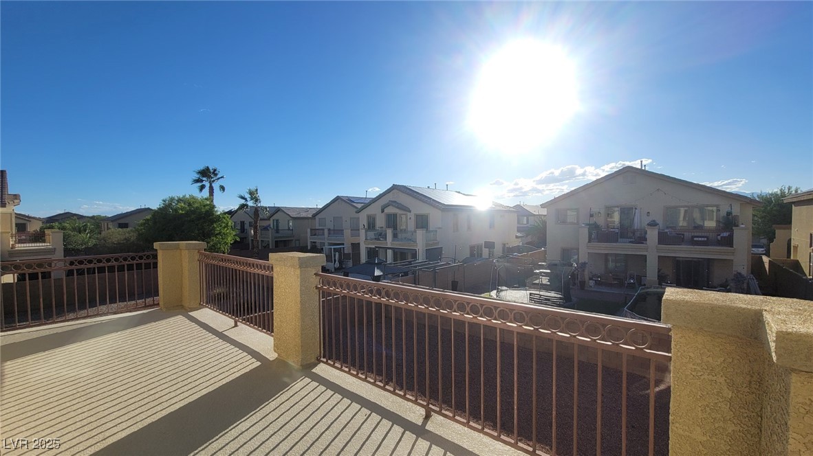 5913 Altissimo Street North Las Vegas, NV 89081 - Photo 17 of 37 Balcony with a residential view