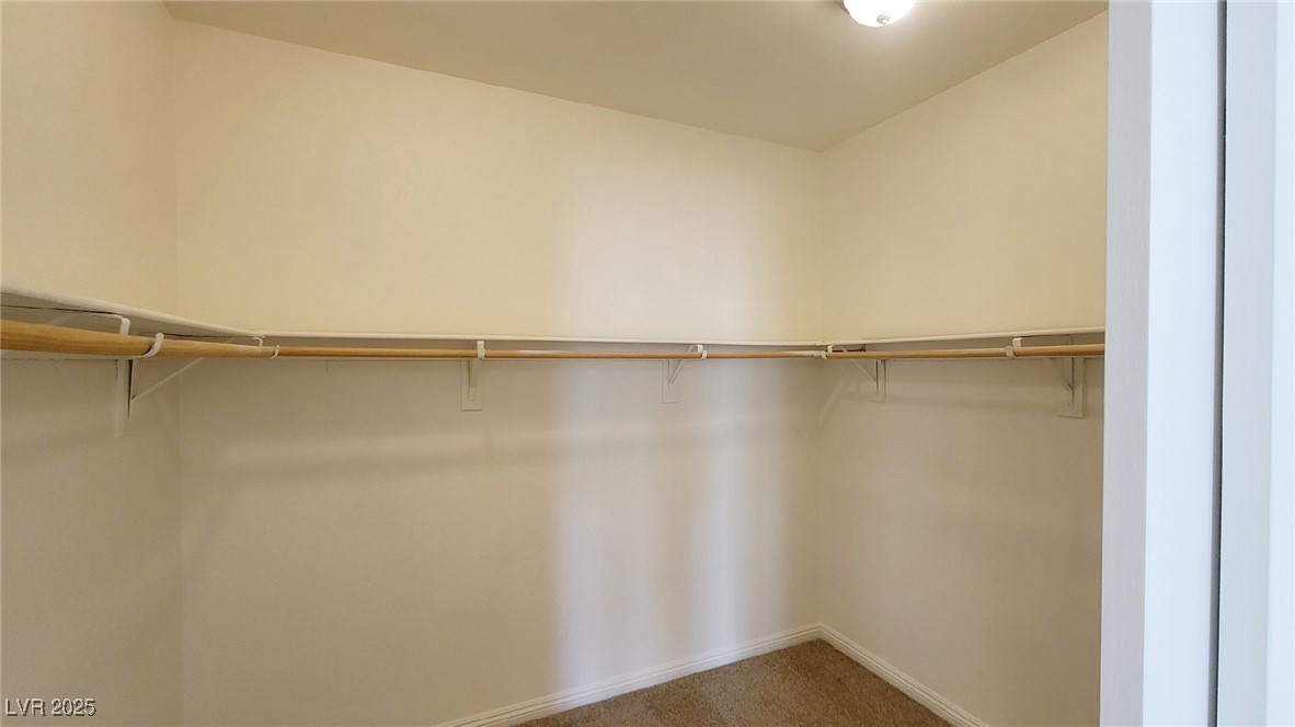 5913 Altissimo Street North Las Vegas, NV 89081 - Photo 18 of 37 Spacious closet with carpet floors