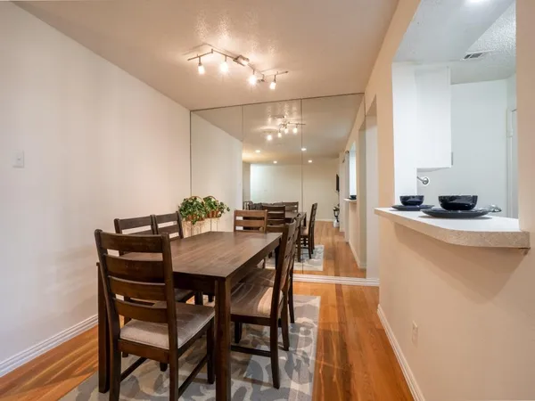 a view of a dining room with furniture