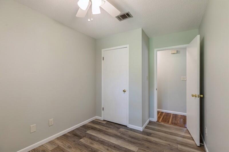 1086 County Highway 183 North DeFuniak Springs, FL 32433 - Photo 20 of 39 a view of hallway with wooden floor