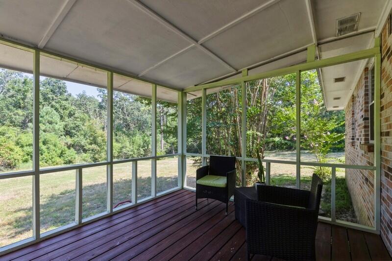 1086 County Highway 183 North DeFuniak Springs, FL 32433 - Photo 31 of 39 a balcony with wooden floor and outdoor space