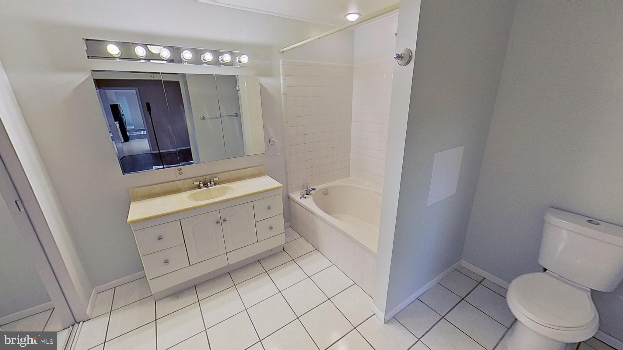 118 Carea Road New Park, PA 17352 - Photo 7 of 7 a bathroom with a granite countertop sink toilet and shower